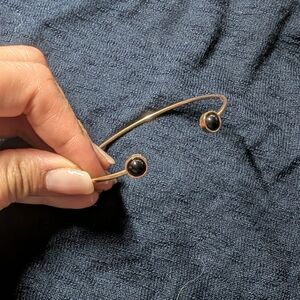 Gold Open Cuff Bracelet with Black Stone Ends